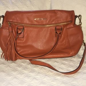 Orange colored Michael Kors Purse
